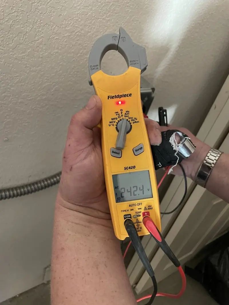 Voltage testing with clamp meter during Circuit Breaker Repair in Agawam Town